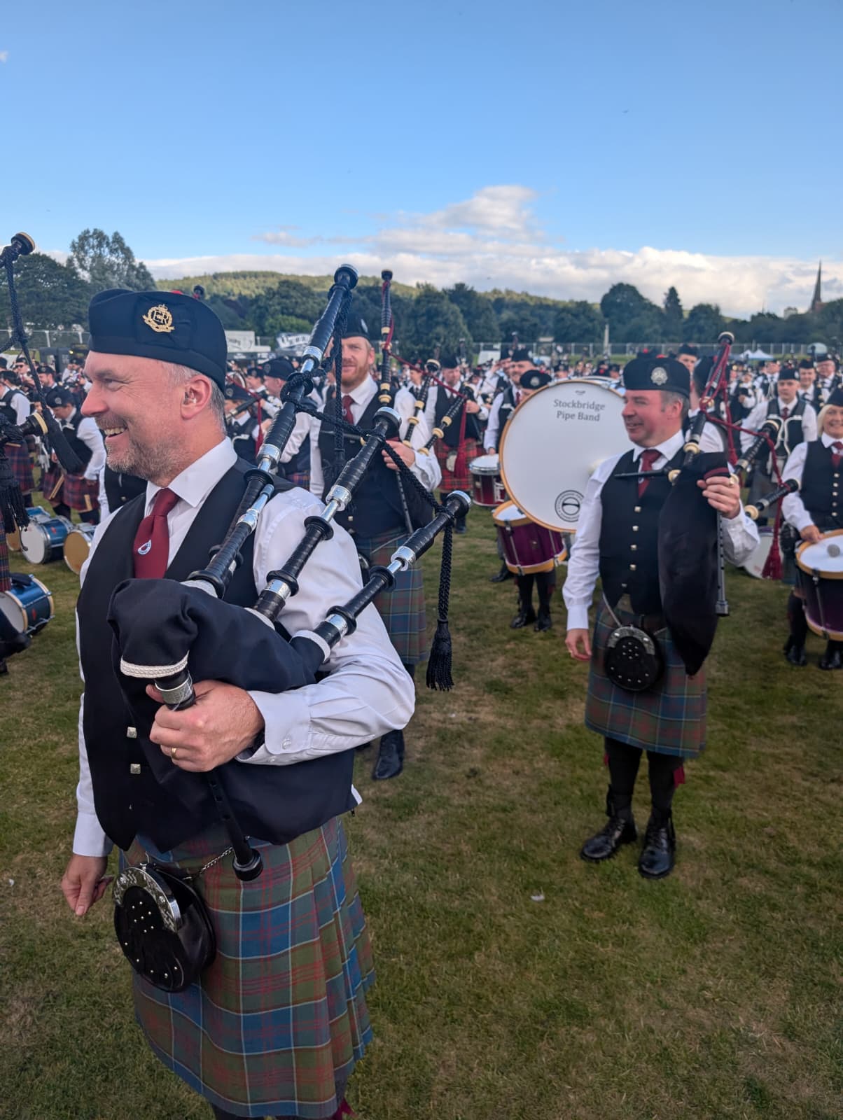 Stockbridge Pipe Band marching in the Perth Highland Games March Past 2026